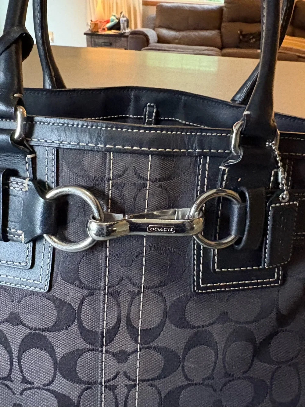 Coach tote featuring